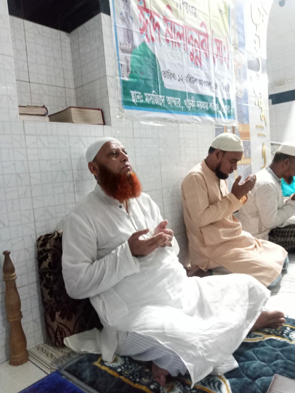 Kamrul Hasan in prayer at the Darbar